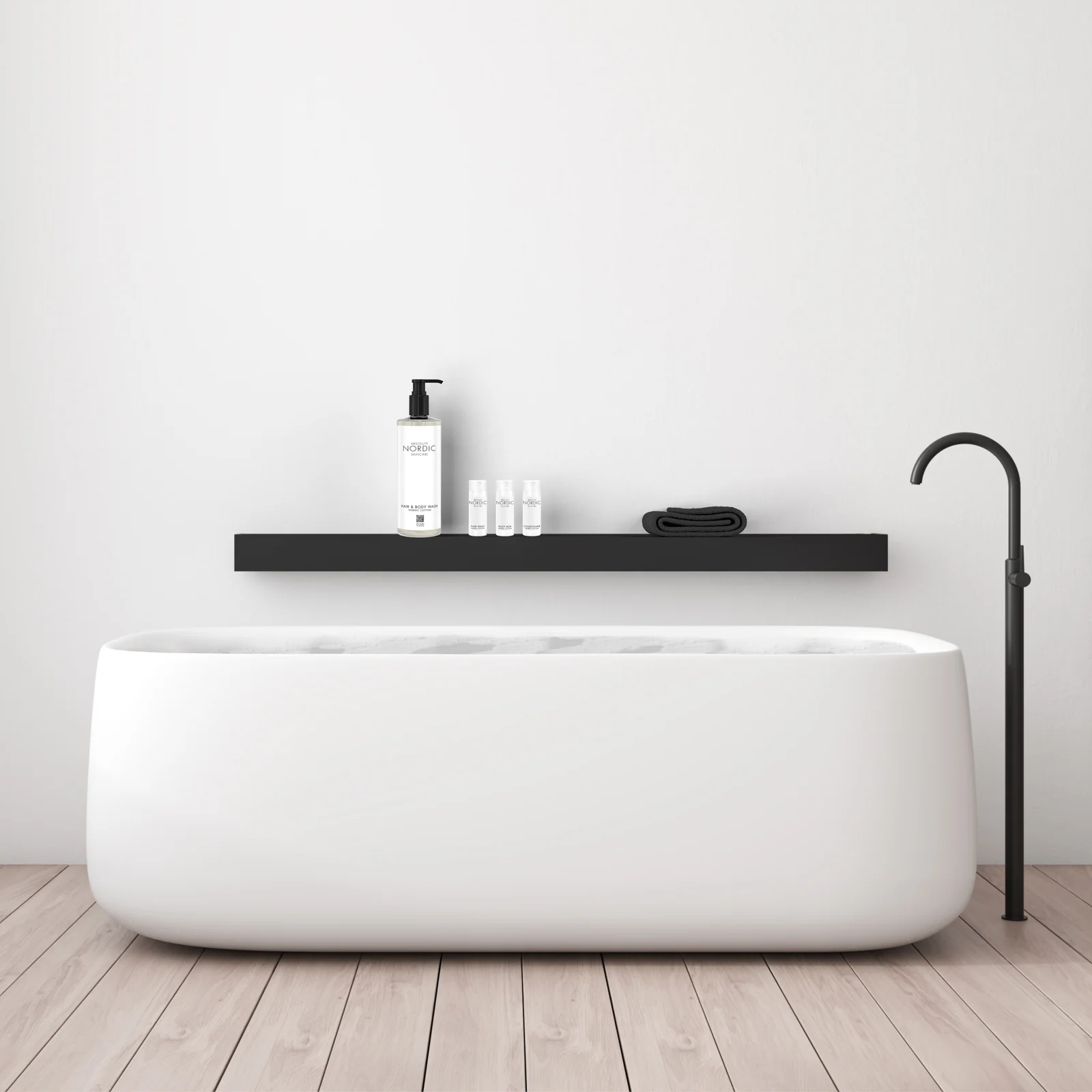 Bathroom with a white tub and a black shelf holding Absolute Nordic Skincare bottles