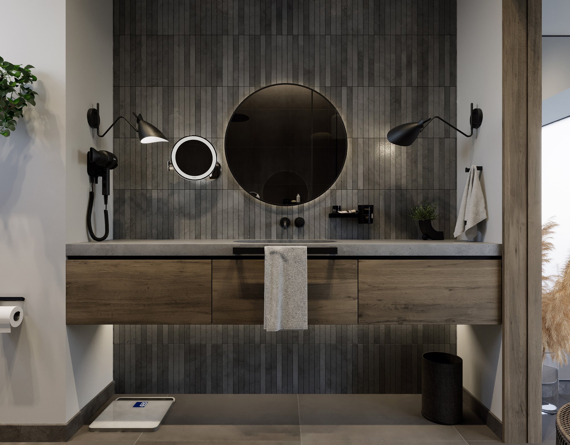 Hotel bathroom with a round mirror, cosmetic mirror, hair dryer and black Aliseo accessories